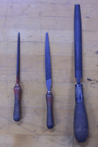 various hand files and card file used for cleaning the files